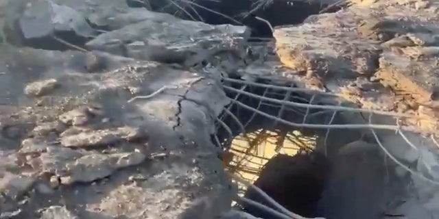 A view shows the damaged Antonivskyi bridge in the aftermath of shelling, in Kherson, Ukraine, in this screen grab obtained from a social media video released July 27, 2022.