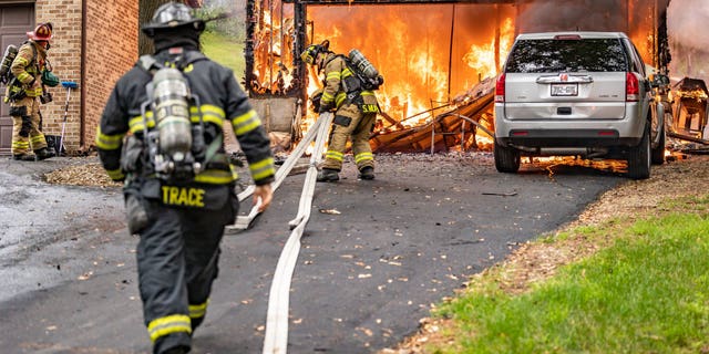 Janesville Fire Department Firefighters respond to a fire on July 17, 2022