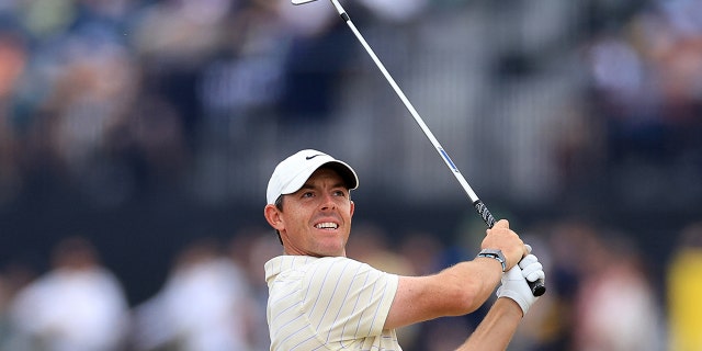 Northern Ireland's Rory McIlroy will make a second shot on the 4th hole in the final round of the 150th Open on the Old Course of St Andrews on July 17, 2022 in St Andrews, Scotland.