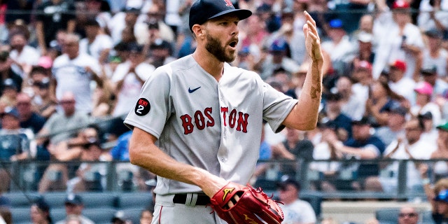 Boston Red Sox starting pitcher Chris Sale comes off the hill after injuring his hand during the first inning of a game against the New York Yankees on Sunday, July 17, 2022, in New York City.