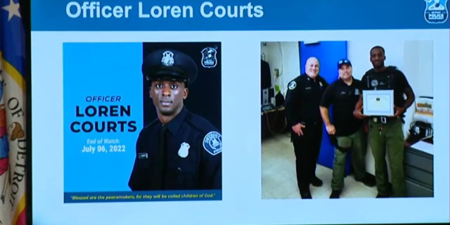 Images of fallen Detroit Police Officer Loren Courts are seen at a press conference, July 7, 2022.