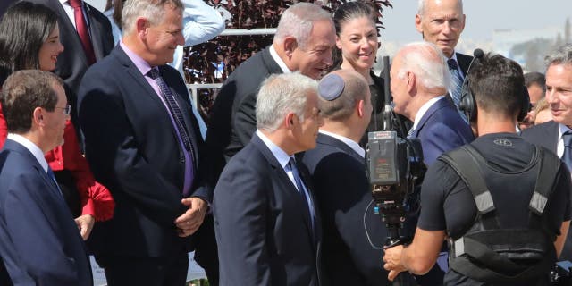 President Joe Biden shakes hands with Benjamin Netanyahu during a recent visit to Israel.