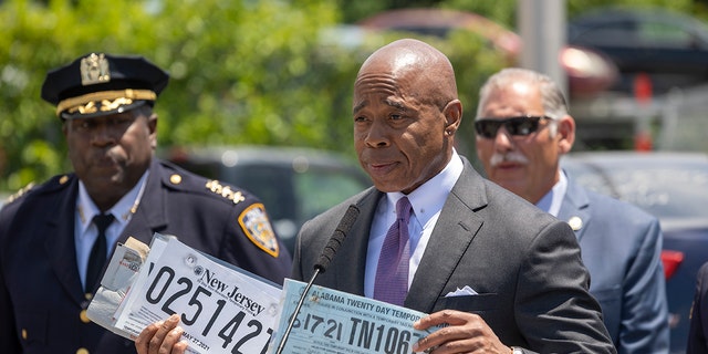 New York City Mayor Eric Adams speaks about a crackdown on counterfeit temporary license plates on July 5, 2022 in Springfield Gardens, Queens. 