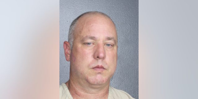 Florida police Sgt. Christopher Pullease has been charged with battery for grabbing a fellow officer by the neck.