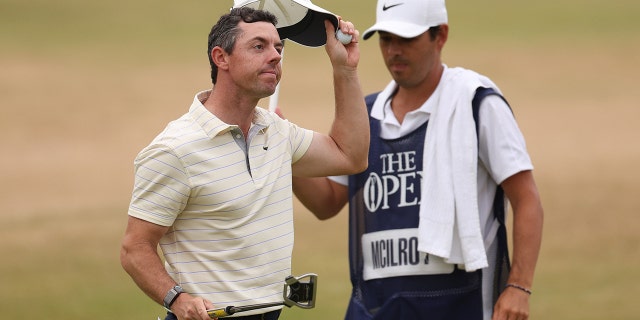 Rory McIlroy of Northern Ireland acknowledges the crowd on the 18th green during The 150th Open at St. Andrews Old Course July 17, 2022, in St. Andrews, Scotland.