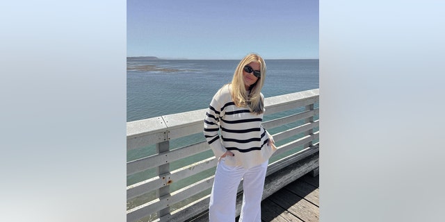 Tiktoker Lex Nicoleta wears the "coastal grandmother" look on a pier in Cambria, California, on July 4, 2022.