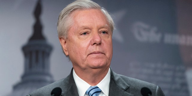 Sen. Lindsey Graham, R-S.C., speaks with reporters about aid to Ukraine on Capitol Hill Wednesday, March 10, 2022, in Washington.  