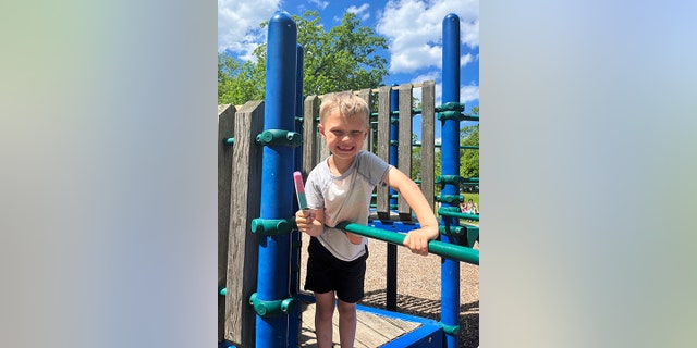 This handout photo provided by the Roberts family shows Cooper Roberts, who along with his twin brother and parents, attended the July 4th parade in Highland Park, Illinois.