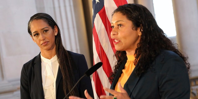 Mayor London Breed addresses a news conference as Brooke Jenkins looks on at City Hall, July 7, 2022, in San Francisco. 