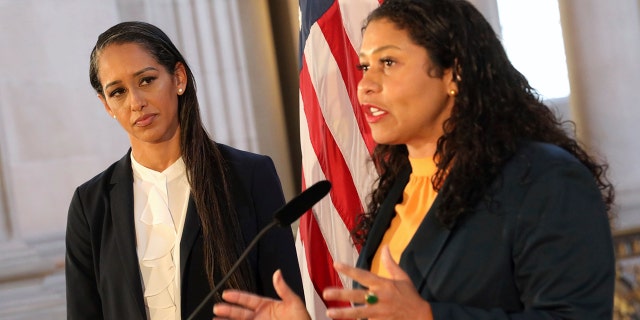 Mayor London Breed addresses a news conference as Brooke Jenkins looks on at City Hall, Thursday, July 7, 2022, in San Francisco. 