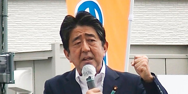 In this image from a video, Japan’s former Prime Minister Shinzo Abe makes a campaign speech in Nara, western Japan shortly before he was shot Friday, July 8, 2022. 