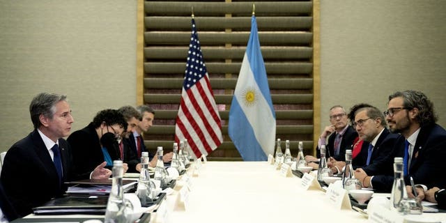 U.S. Secretary of State Antony Blinken, left, meets with Argentine Foreign Minister Santiago Cafiero, right, during the G-20 Foreign Ministers Summit in Nusa Dua, on Indonesia's resort island of Bali Friday, July 8, 2022. 