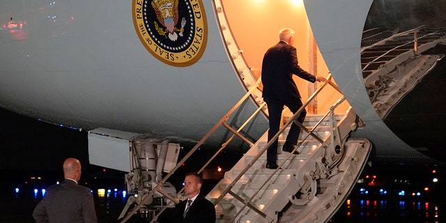President Joe Biden boards Air Force One for a trip to Israel and Saudi Arabia, Tuesday, July 12, 2022, at Andrews Air Force Base, Maryland. 