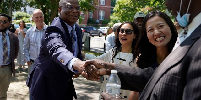 Michael Cox, left, has been named as the next Boston police commissioner.