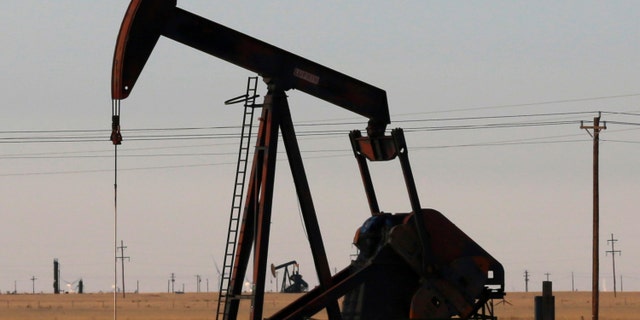 FILE - A pumpjack as seen on Wednesday, March 30, 2022, in Tatum, New Mexico.  President Joe Biden is promising 