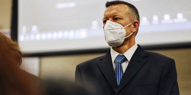 Paul Flores stands during his murder trial in Monterey County Superior Court in Salinas, Calif., Monday, July 18, 2022. 