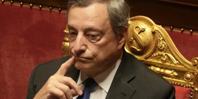 Italian Premier Mario Draghi attends a debate at the Senate in Rome, Wednesday, July 20, 2022. Draghi was deciding Wednesday whether to confirm his resignation or reconsider appeals to rebuild his parliamentary majority after the populist 5-Star Movement triggered a crisis in the government by withholding its support.
