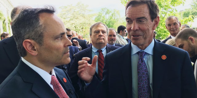Braidy Industries Inc. CEO Craig Bouchard, right, and then-Republican Kentucky Gov. Matt Bevin speaks with reporters in Wurtland, Ky., on April 26, 2017. Braidy Industries still needs to raise $500 million to build a long-promised $1.7 billion aluminum plant in Appalachia, a top company executive told Kentucky lawmakers on Tuesday, July 19, 2022.