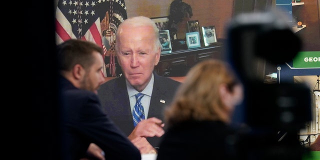 President Joe Biden listens as he attends virtually an event in the South Court Auditorium on the White House complex in Washington, Monday, July 25, 2022.