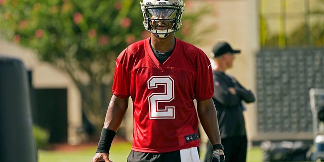 New Orleans Saints quarterback Jameis Winston, #2, pauses between drills during the NFL football team's training camp in Metairie, La., Wednesday, July 27, 2022. 