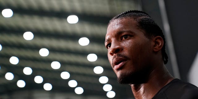 New Orleans Saints quarterback Jameis Winston talks with reporters during training camp at their NFL football training facility in Metairie, La., Wednesday, July 27, 2022.