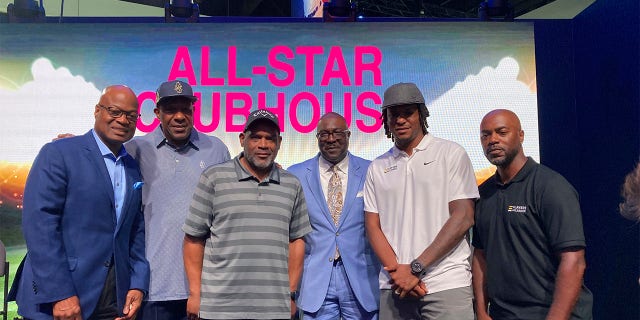 From left, Seattle Mariners announcer Dave Sims, former All-Stars Andre Dawson and Tim Raines, Negro Leagues Museum president Bob Kendrick, and retired All-Stars Edwin Jackson and Jimmy Rollins chat after participating in a panel, Monday, July 18. 2022, on the life and legacy of Jackie Robinson in Los Angeles.