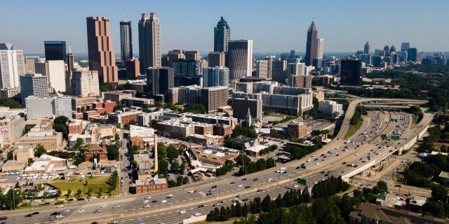 Vehicles travel along a highway in Atlanta, Georgia, US, on Wednesday, June 22, 2022.