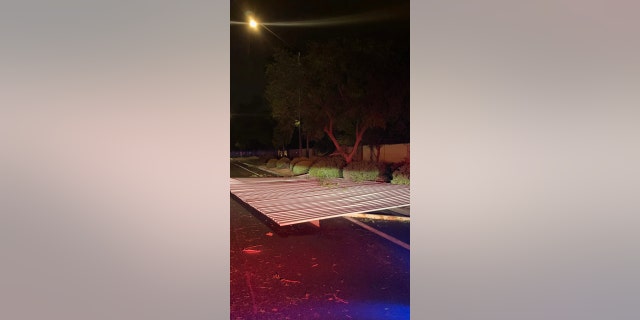 Debris blocks a roadway in the town of Gilbert, Arizona