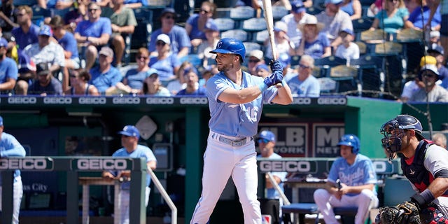 Andrew Benintendi #16 of the Kansas City Royals bats against the Cleveland Guardians in the first inning at Kauffman Stadium on July 9, 2022 in Kansas City, Missouri. 