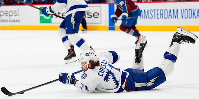 Tampa Bay Lightning center Anthony Cirelli, 71, practices a puck off the ice against the Colorado Avalanche in the second period of Game 5 of the Stanley Cup Hockey Finals on Friday, June 24, 2022, in Denver. 