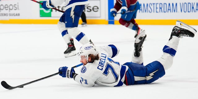 Tampa Bay Lightning center Anthony Cirelli, 71, practices a puck off the ice against the Colorado Avalanche in the second period of Game 5 of the Stanley Cup Hockey Finals on Friday, June 24, 2022, in Denver.