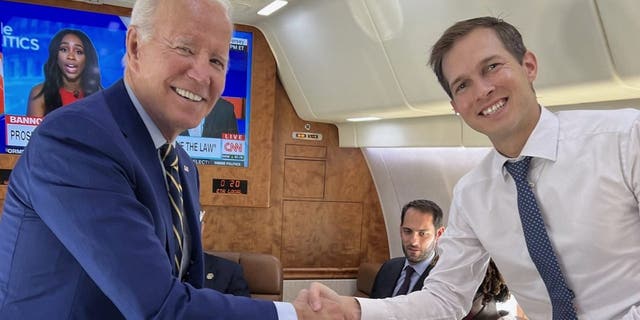 Rep. Jake Auchincloss tweeted photos of himself with President Biden traveling together a day before the president tested positive for COVID-19