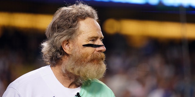 LOS ANGELES, CA - JULY 16:  Bryan Cranston looks on during the MGM All-Star Celebrity Softball Game at Dodger Stadium on Saturday, July 16, 2022 in Los Angeles, California. (Photo by Daniel Shirey/MLB Photos via Getty Images)