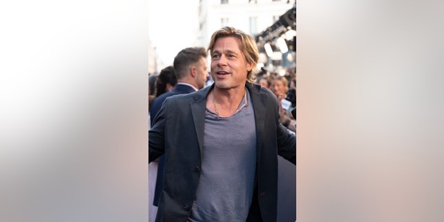 Pitt attends a photo call for the film "Bullet Train"at le Grand Rex in Paris.