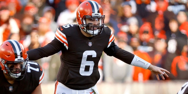 Browns quarterback Baker Mayfield lines up for a play against the Baltimore Ravens, on Dec. 12, 2021, in Cleveland.