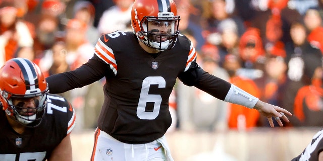 Browns quarterback Baker Mayfield lines up for a play against the Baltimore Ravens, on Dec. 12, 2021, in Cleveland.