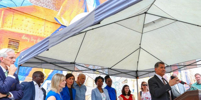 Xavier Becerra, Secretary of the Department of Health and Human Services, speaks at a press conference to launch the new 988 National Mental Health Helpline on Friday, July 15, 2022, in Philadelphia.  The press conference took place in front of the artist Eric Okde's mural 