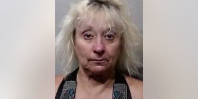 Becky Vreeland seen in her booking photo at the Cleveland County Jail.