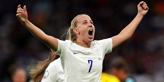 England's Beth Mead celebrates scoring the opening goal during the Women's Euro 2022 soccer match between England and Austria at Old Trafford in Manchester, England, Wednesday, July 6, 2022. 