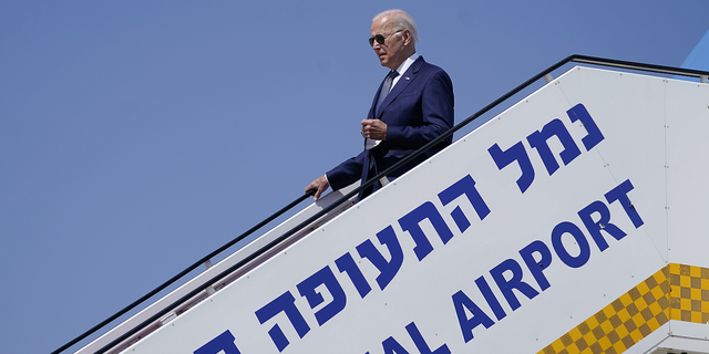 President Joe Biden walks off of Air Force One as he arrives at Ben Gurion Airport.