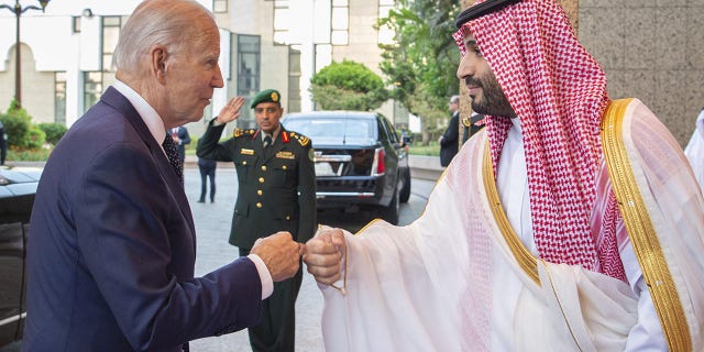 President Joe Biden, left, is welcomed by Saudi Arabian Crown Prince Mohammed bin Salman Al Saud in Jeddah, Saudi Arabia, on July 15, 2022.