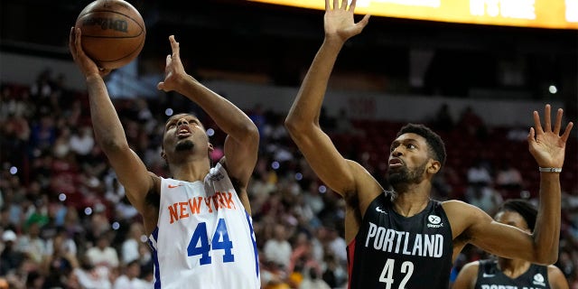 New York Knicks' Feron Hunt shoots against Portland Trail Blazers' Kyle Alexander during the first half an NBA summer league championship basketball game Sunday, July 17, 2022, in Las Vegas.