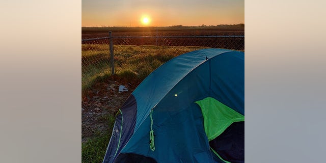 A sunrise at one of Barnes' Iowa campsites is pictured here. When he was in Victor, Iowa, a resident let him spend the night in a neighbor's yard.