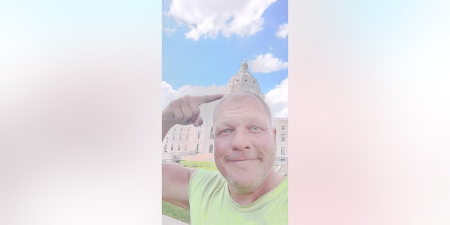 Bob Barnes, 52, of Syracuse has been cycling to all 50 state capitals in one year. Here's a photo he captured when he arrived at capital 42 on his trip — St. Paul, Minnesota.