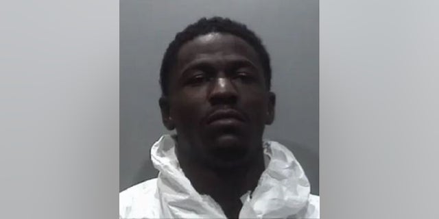 Bobby Wolfe, 22, said he shot and killed his girlfriend in an apartment unit because he believed she was an "intruder," police said.