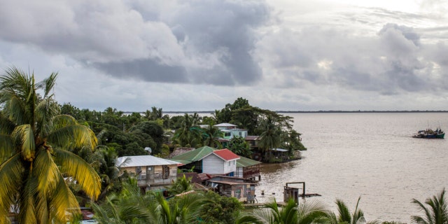 A boat arrives in Bluefields Bay after Tropical Storm Bonnie hit the Caribbean coast of Nicaragua, Saturday, July 2, 2022.