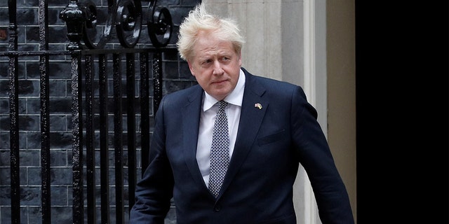 Britain's Prime Minister Boris Johnson arrives to deliver a statement at Downing Street in London, July 7, 2022. 