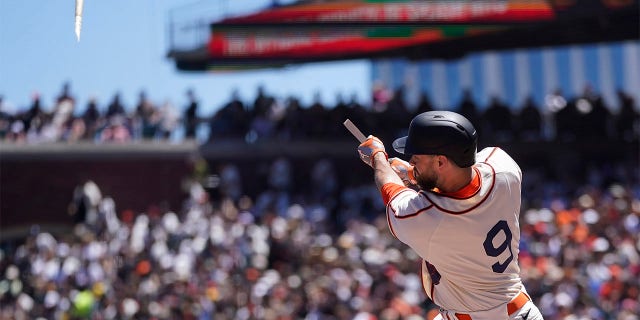 San Francisco Giants' Brandon Belt breaks his bat hitting an RBI single during the second inning of a baseball game against the Milwaukee Brewers in San Francisco, Sunday, July 17, 2022.