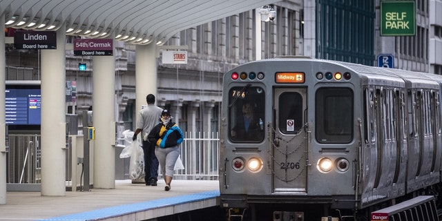 A train arrives at a nearly empty Chicago Transit Authority (CTA) station in Chicago, Illinois, U.S., on Wednesday, June 3, 2020. 