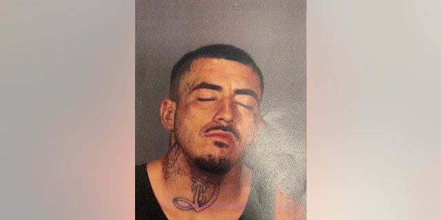Andrew Cachu, who was convicted of shooting a man in the back as gang members held him down, was allegedly asleep with his gun in a car blocking traffic Wednesday night, according to authorities.
